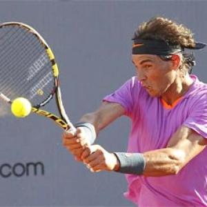 Nadal overcomes slow start to advance in Chile