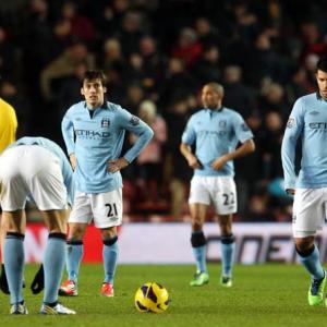 PHOTOS: Man City lose, Chelsea and Arsenal win