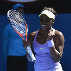 PHOTOS: Stephens stuns ailing Serena, Federer forges on
