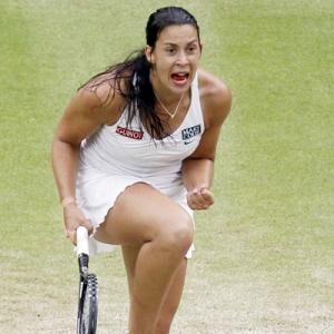 Broadcaster apologises for ' Bartoli not a looker' remark