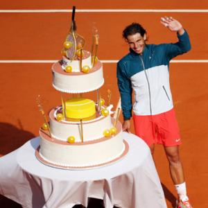 PHOTOS: Birthday boy Nadal reaches last eight in style