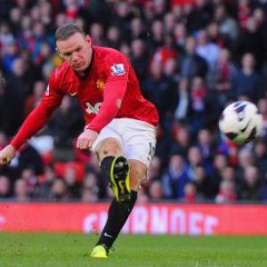 Wenger admits interest in signing Rooney, Fabregas