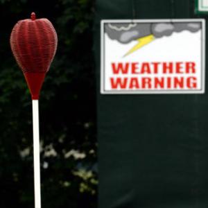 Play suspended at stormy US Open