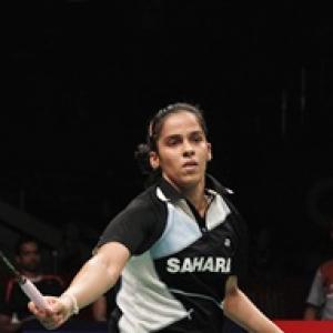 Saina in quarters at Singapore; Praneeth goes down fighting