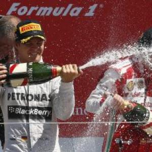Rosberg triumphs in Britain after Vettel retires