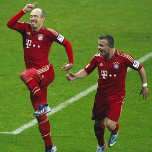 Bayern crush Hamburg 9-2 to stride towards title