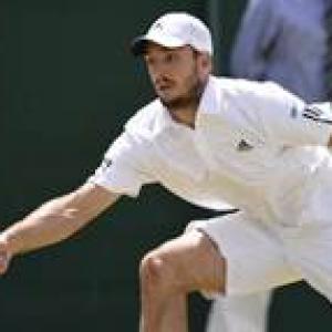 Troicki doping ban cut to 12 months from 18