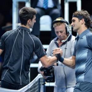 Djokovic douses Federer's fire, Nadal crushes Ferrer