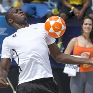 'Sprint King' Bolt signs for a football team
