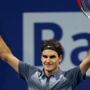 Federer strengthens bid for Tour finals with Pospisil win