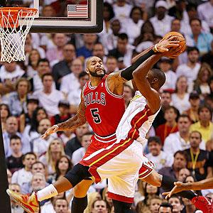 NBA: Heat burn down Bulls in season-opening win