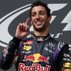 Ricciardo wins at Spa after title rivals collide