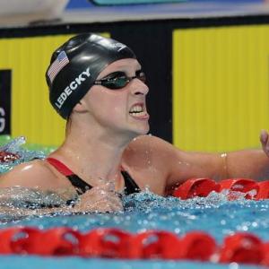 Sports Shorts: Ledecky breaks world record to overshadow Phelps