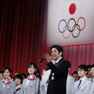 Japan PM may attend Sochi Games, China says no plans to meet Xi