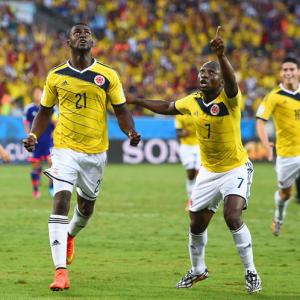 PHOTOS: Colombia top Group C; Greece scrape through