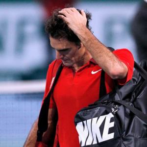 Federer's number one hopes take a hit in Paris defeat