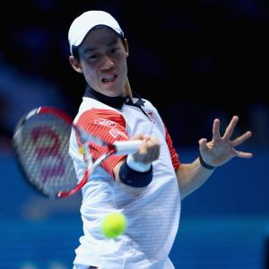 Nishikori powers to victory over Murray at Tour Finals