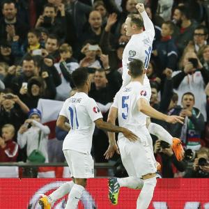 Euro qualifiers: Rooney scores in 100th match as England rally; Spain win