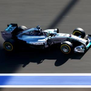 Hamilton puts Mercedes on pole in Russia