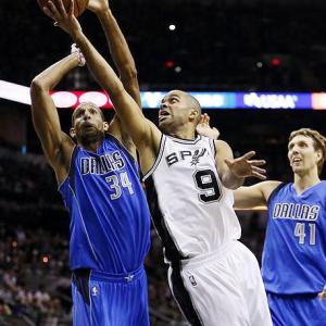 NBA: Spurs edge Mavs in San Antonio to open title defense