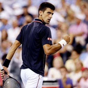 US Open: Djokovic wears down Murray to reach last four