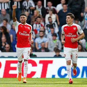 Premier League: Arsenal labour to victory over 10-man Newcastle