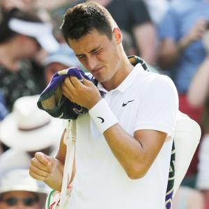 'Arrogant brat' Tomic withdraws from Rome Masters after eight minutes