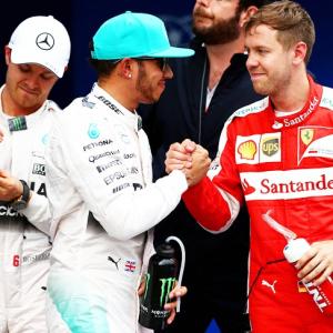 Malaysian GP: Hamilton holds of resurgent Vettel for pole