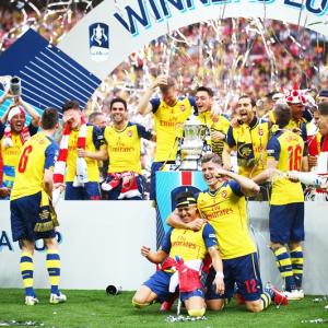With FA Cup in their bag, Arsenal eye Premier League glory