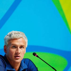 US swimmer Lochte says gun held to forehead in taxi hold-up