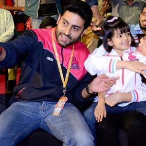 PIX: Junior Bachchan enjoys kabaddi match with wife and daughter