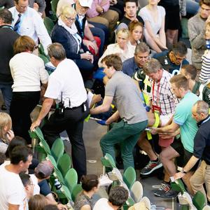 Ivanovic bows out after coach hospitalised following collapse in stands
