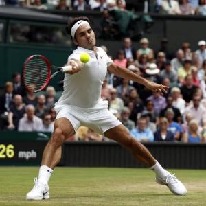 PHOTOS: Federer storms into quarters, Nishikori retires with injury