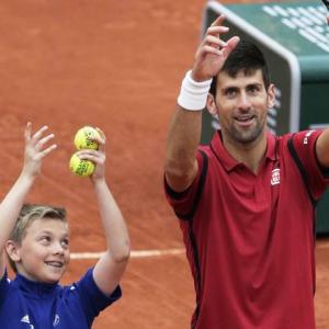 Djokovic, Serena avoid distractions of French Open 'circus'