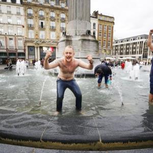 Ecstatic England fans party in Lille after winning 'Battle of Britain'