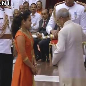 Olympians Sakshi, Karmakar receive Padma honours