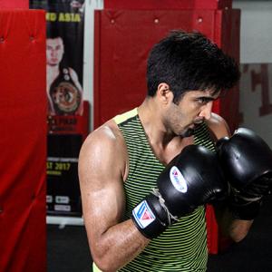 Will not rush things for world title: Vijender