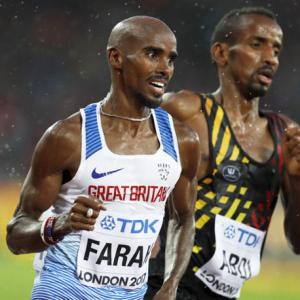 Farah advances in 5,000 metre for final assault on track gold