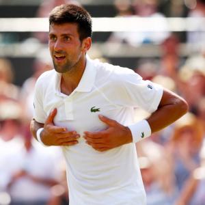 Djokovic means business as he reaches fourth round