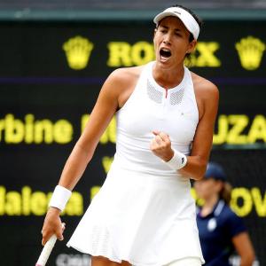 Muguruza crushes Rybarikova to storm into Wimbledon final