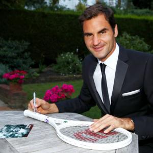 Federer beats Woods to become highest-paid athlete