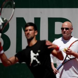 McEnroe urges Agassi to spend more time with Djokovic