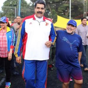 Maradona cozies up to controversial Venezuelan President