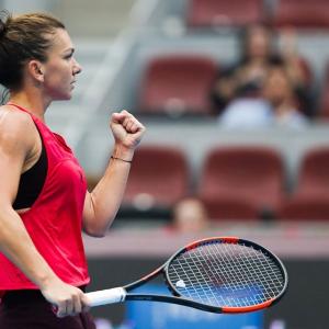 Tennis Roundup: Halep knocks out Sharapova, Ostapenko makes WTA Finals