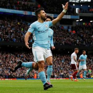 EPL Images: Aguero's milestone goal leads Man City to easy win