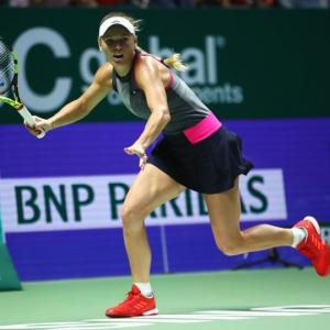 WTA Finals: Dominant Wozniacki swats aside Halep