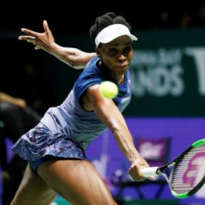 Evergreen Venus rallies past Garcia to set up Wozniacki final