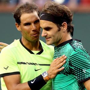 Federer and Nadal move within sight of landmark meeting