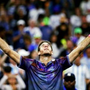 US Open PIX: Ailing Del Potro survives, Federer eases through