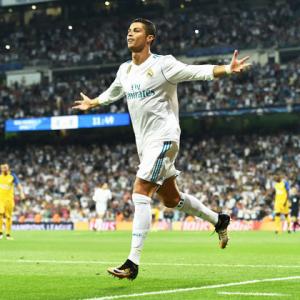 Champions League PIX: Real crush APOEL; English clubs off to good start